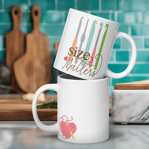 Crafting Humor: White Glossy Mug with 'Size Matters' Crochet Theme - Dorky Doodles