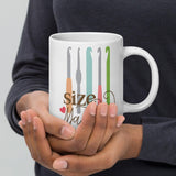 Crafting Humor: White Glossy Mug with 'Size Matters' Crochet Theme - Dorky Doodles