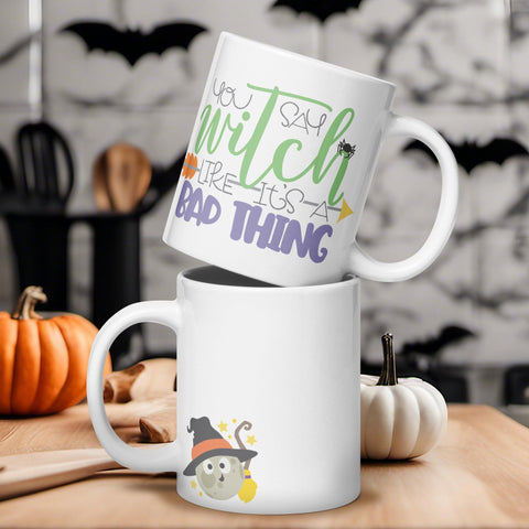 Witchy Humor: White Glossy Halloween Mug with a Playful Twist - Dorky Doodles