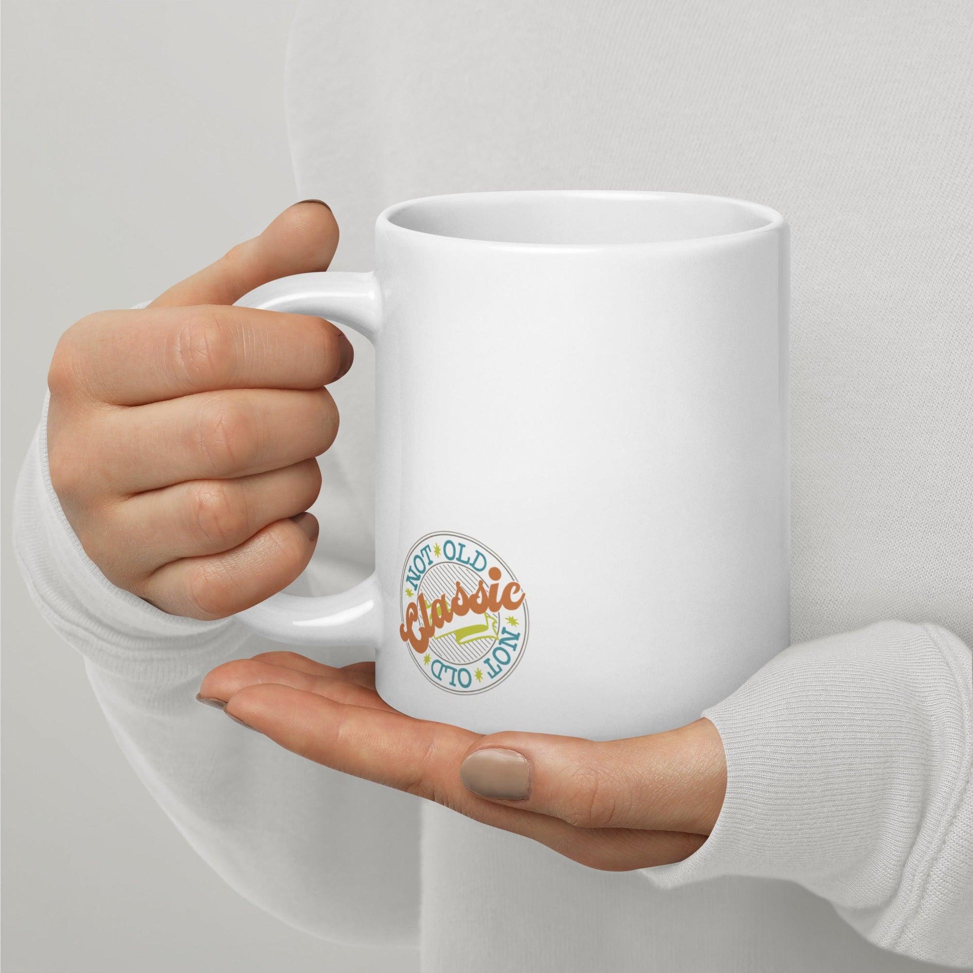 Witty Wisdom: White Glossy Mug with 'Every Moment is a Senior Moment' - Dorky Doodles